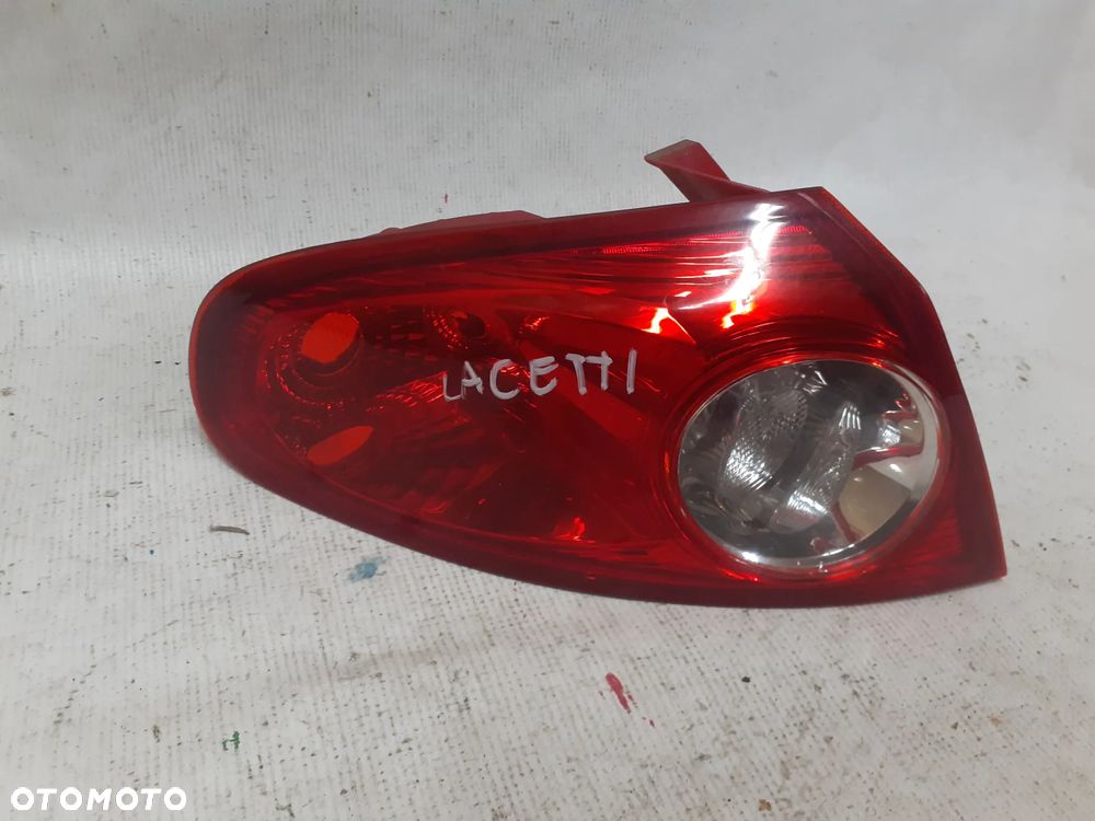 .  TYL TYLNA LAMPA LEWA CHEVROLET LACETTI - 1