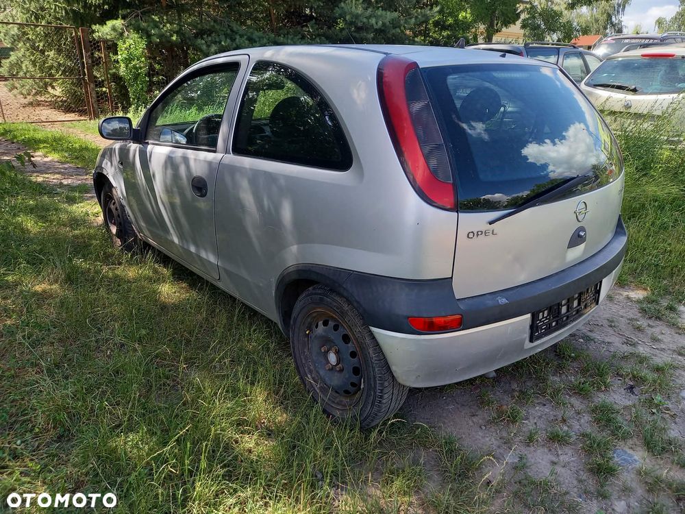 części OPEL CORSA C hatchback 3drzwi 1.0 benzyna 2002r. Srebrny maska drzwi zderzak klapa fotele - 4