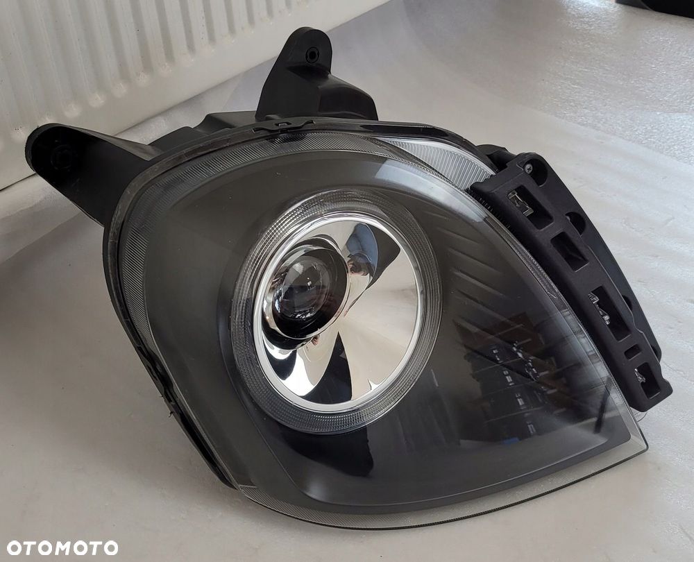 LAMPA PRAWA PRZÓD PRZEDNIA LEVC TX VN5 - 3