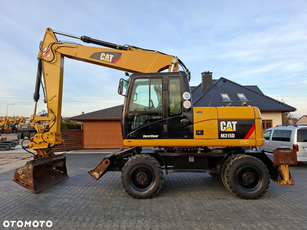 Caterpillar CAT M315D Rok 2011 - 6