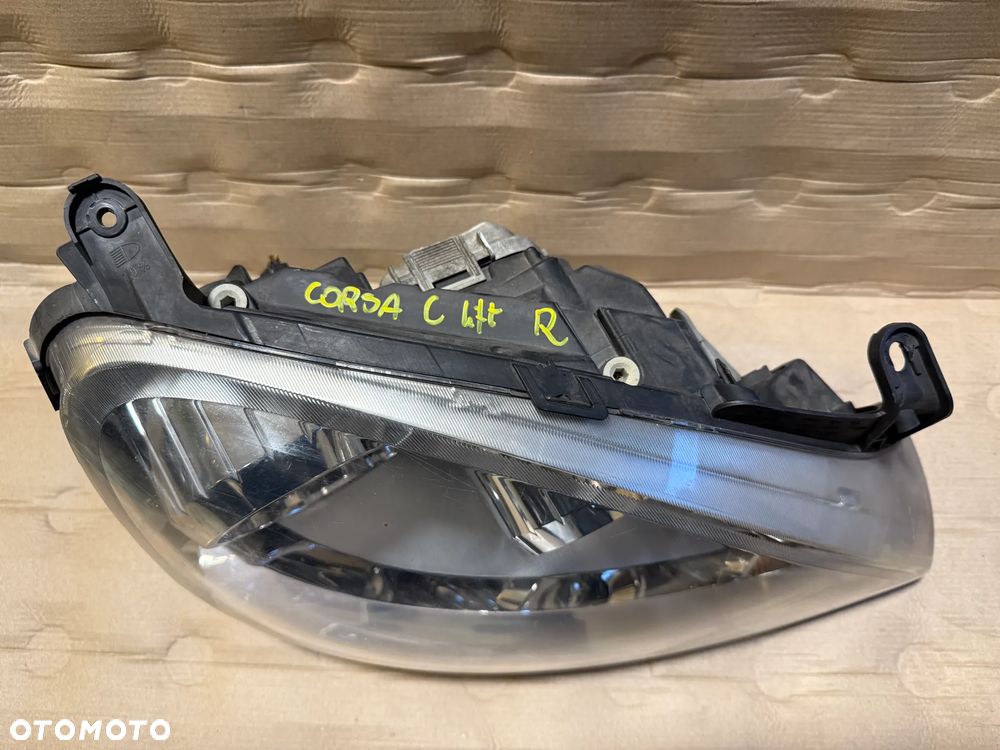 Lampa Opel Corsa C lift 13100536 prawa 13100535 lewa OE - 6