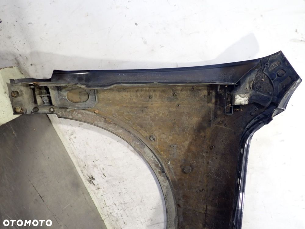 BŁOTNIK LEWY PRZEDNI VOLKSWAGEN TOUAREG 5.0 - 10