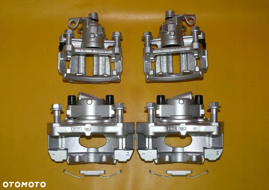 ZACISKI JARZMA LEWY PRAWY PRZÓD TYŁ VW TRANSPORTER T5 308/29,5 294/22mm 03- - 8