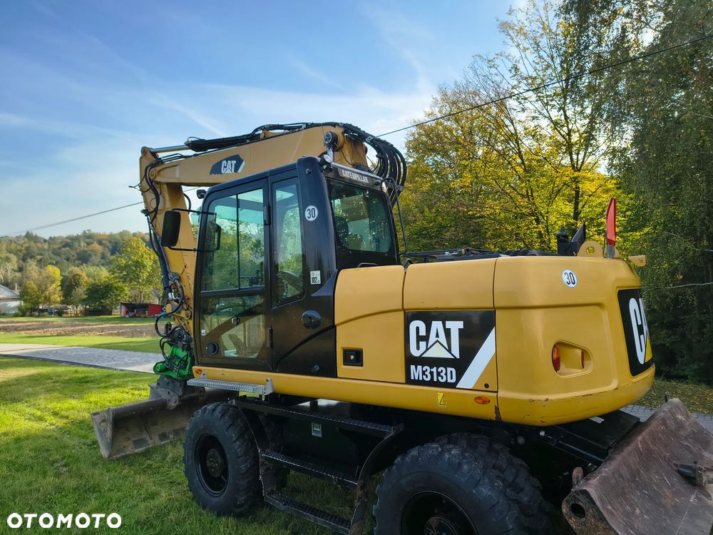 Caterpillar M313D - 4