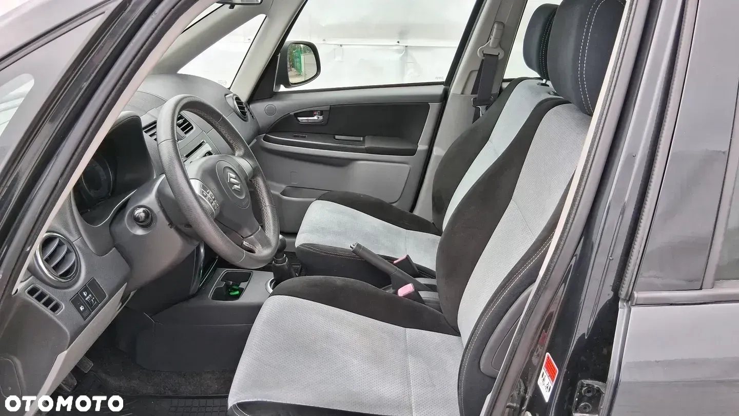 Suzuki SX4 1.6 Comfort Plus - 10