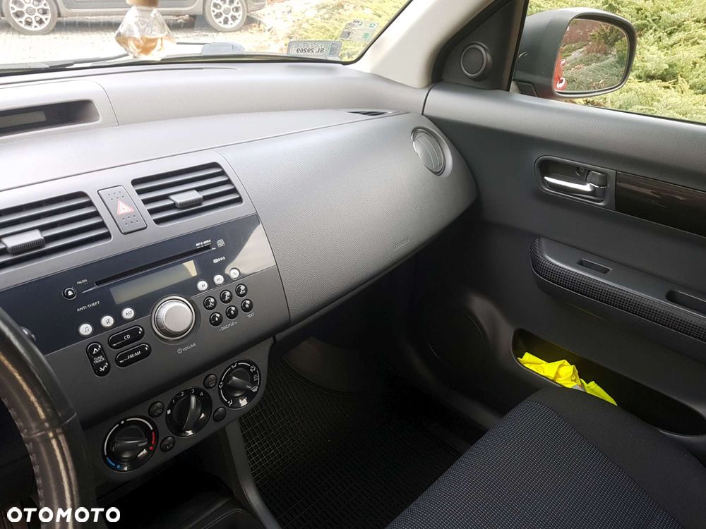 Suzuki Swift 1.3 Club - 9