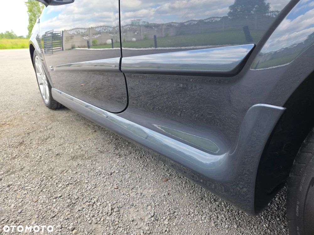 Opel Astra 1.8 Sport - 23