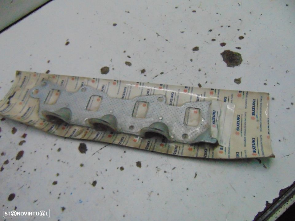 Suzuki junta do colector - 4