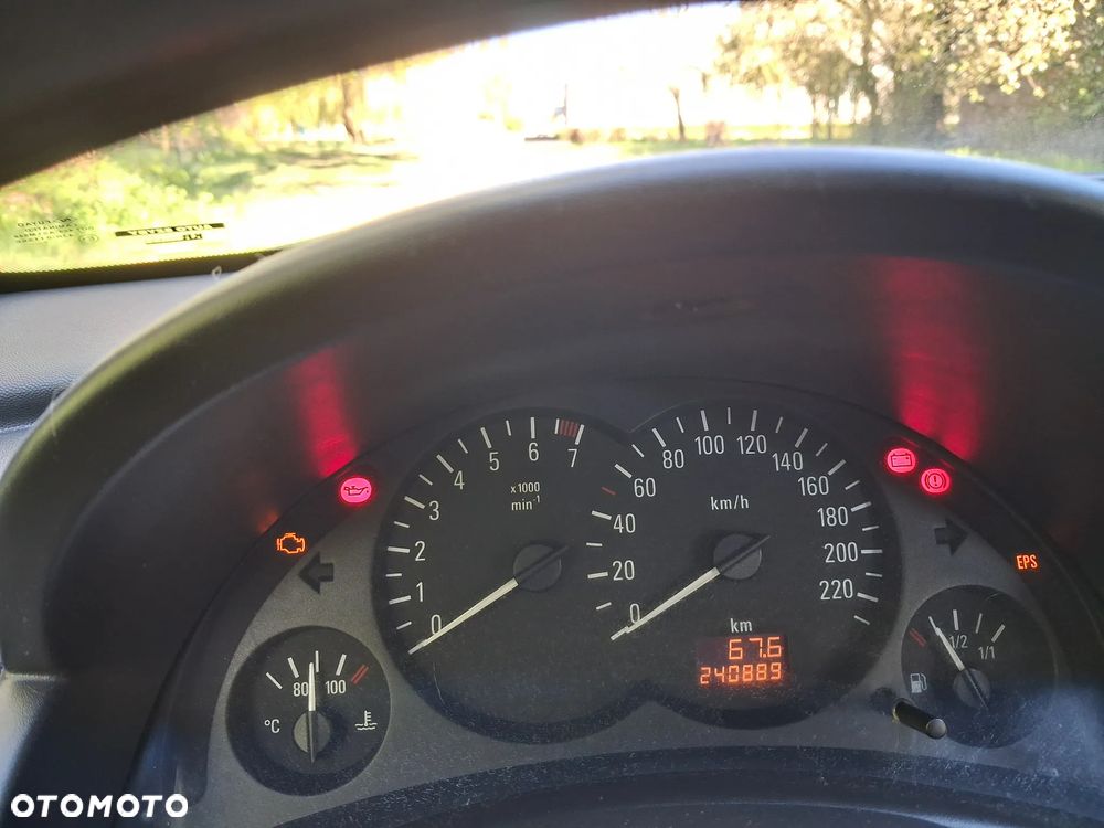 Opel Corsa 1.2 16V Cosmo - 9