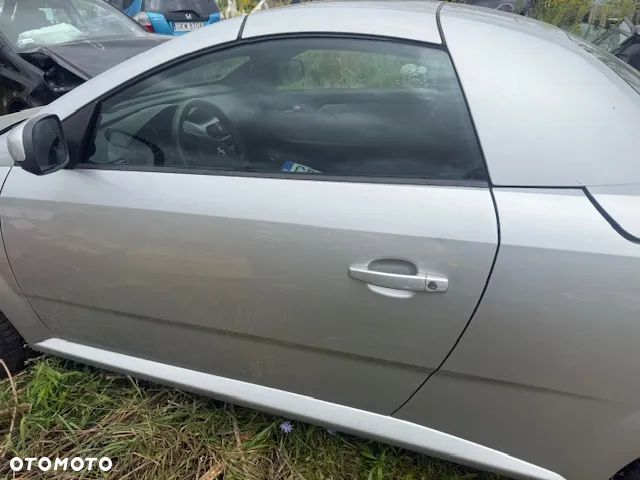 OPEL TIGRA B DRZWI LEWE LUB  PRAWE Z157 LUSTERKO SZYBA ZAMEK PODNOSNIK - 1
