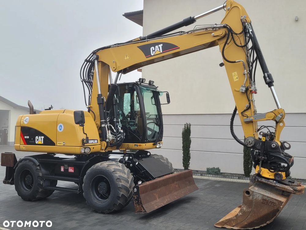 Caterpillar M313D / ROTOTILT ze szczypcami / serwisowana /