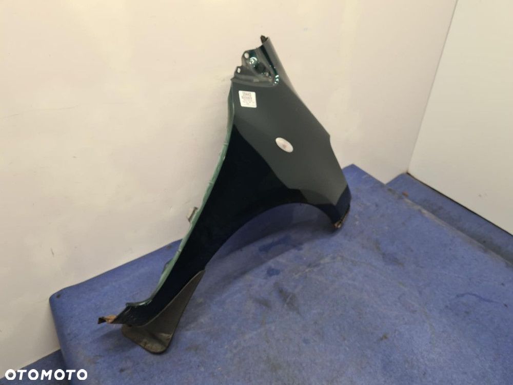 TOYOTA YARIS II LIFT BŁOTNIK PRZÓD PRAWY 6S3 - 2