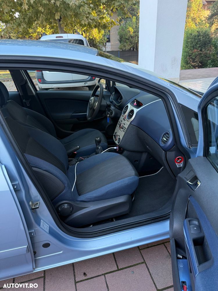 Opel Corsa 1.2i Cosmo - 9