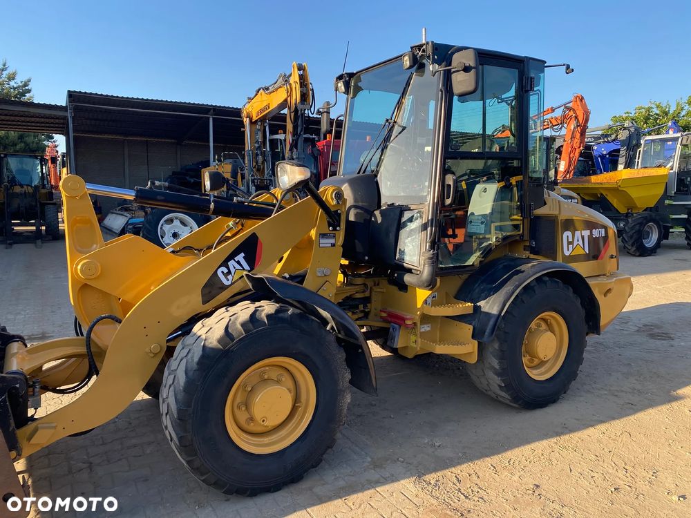 Caterpillar CAT 907H, 2012 ROK, ŁYŻKA OTWIERANA + WIDŁY, z NIEMIEC - 11