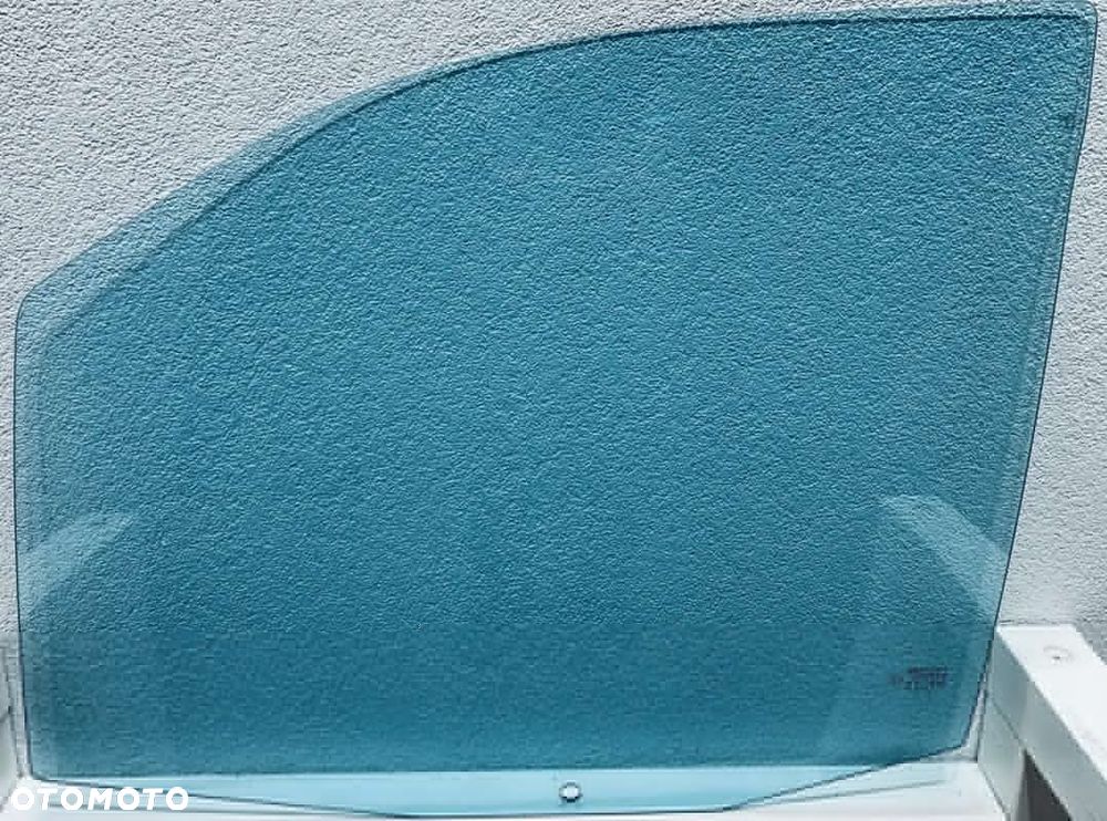 Szyba boczna lewa przednia opuszczana LANCIA LETA 1994- NIEBIESKA