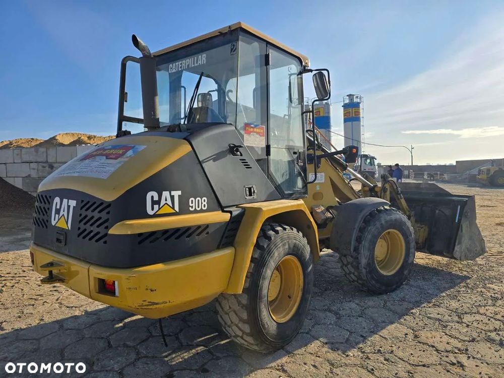 Caterpillar 908 - 5
