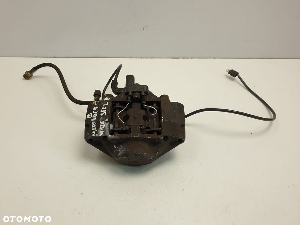 Mercedes W126 SEC 5.6 LEWY ZACISK HAMULCOWY Przód - 1