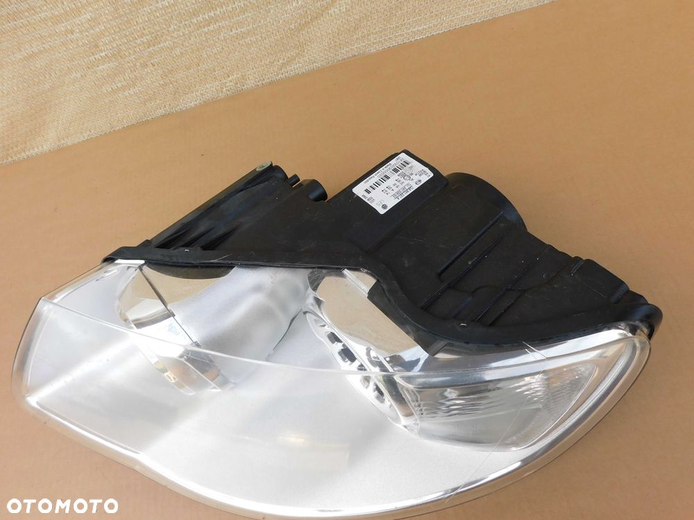 Lampa przód lewa przednia VW Touareg 7L lift 07-10 7L6941031A Hella real foto - 3