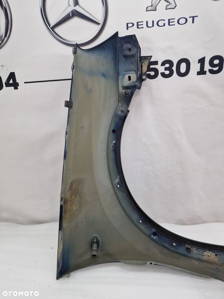 OPEL CORSA C 03- LEWY BŁOTNIK PRZEDNI PRZÓD , KOLOR GRANATOWY NIE METALIK , NR AUKCJI BŁ82 - 14