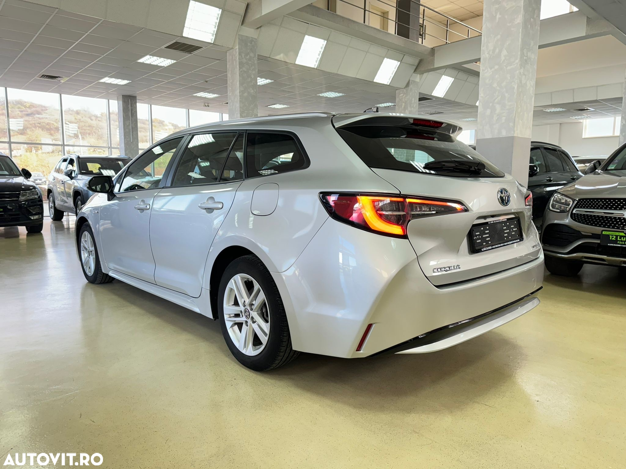 Toyota Corolla 1.8 HSD Business - 10