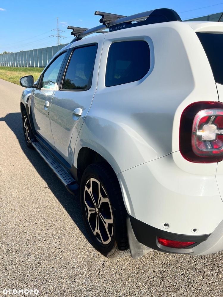 Dacia Duster SCe 115 4x4 Prestige - 32