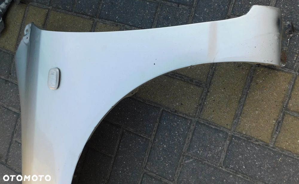 błotnik lewy przód TOYOTA COROLLA E12 HB  EU 1C0 - 6