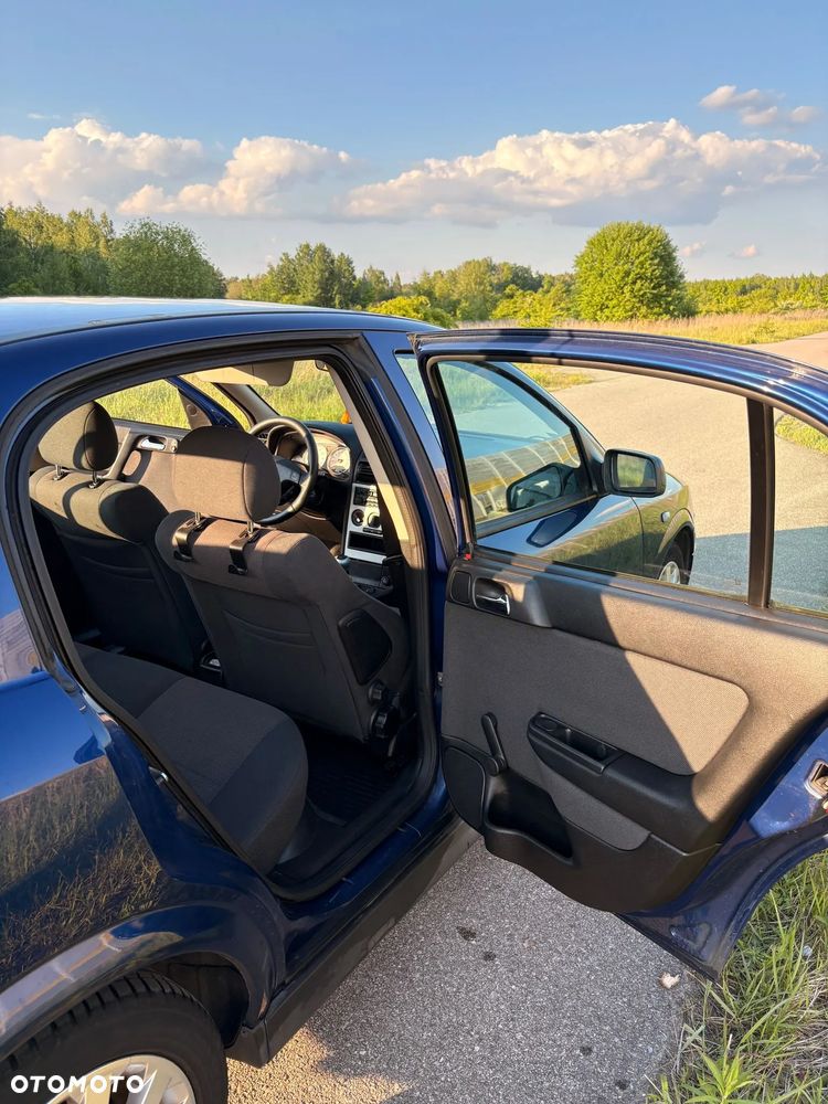 Opel Astra 1.8 Sport - 19