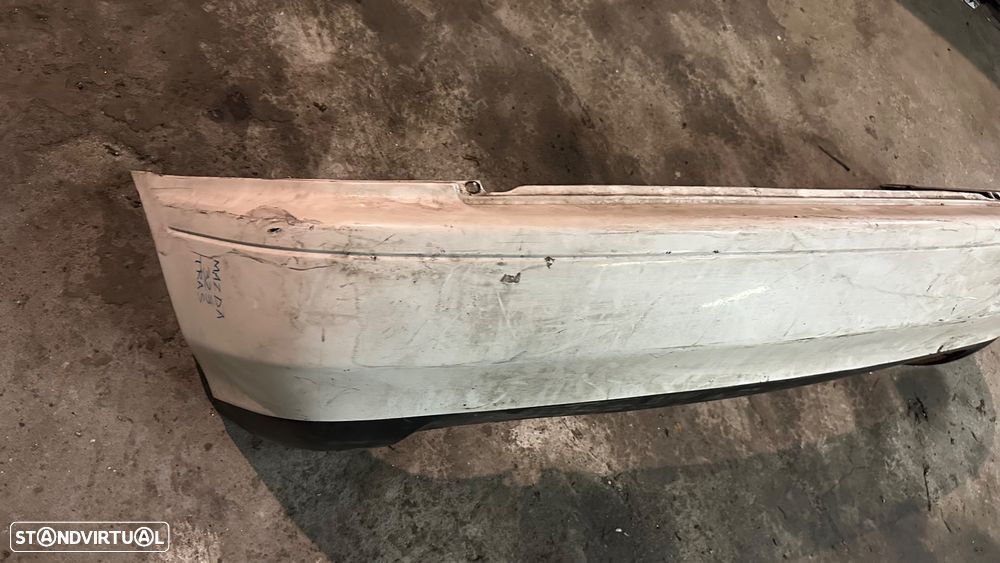 Parachoque Mazda 323 traz - 2