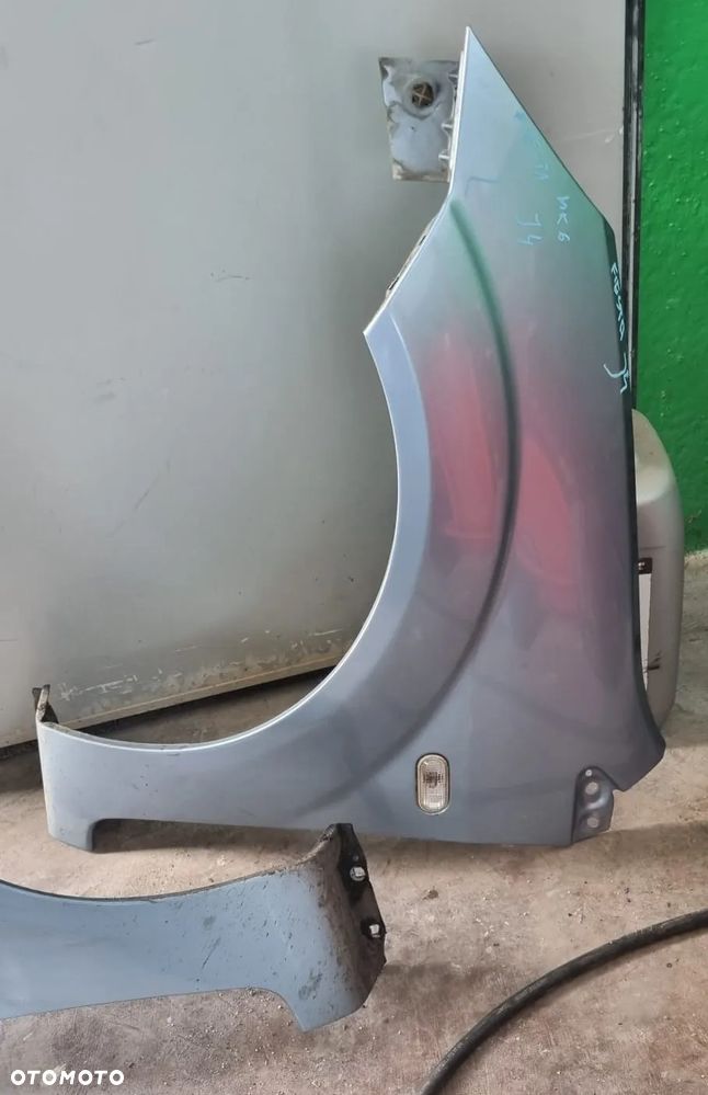 Błotnik Ford Fiesta MK6 J4 prawy OE - 2