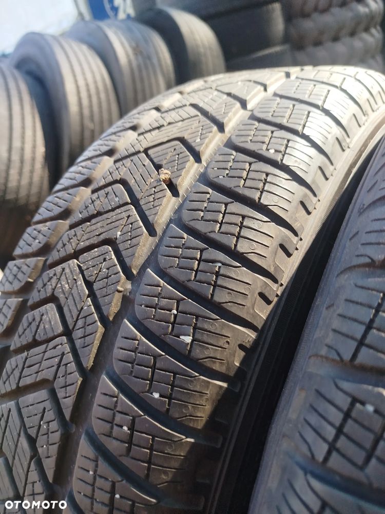 Koła zimowe  VW TIGUAN 5x112 6,5X17 ET36 Pirelli Scorpion Kołpaki OM - 18