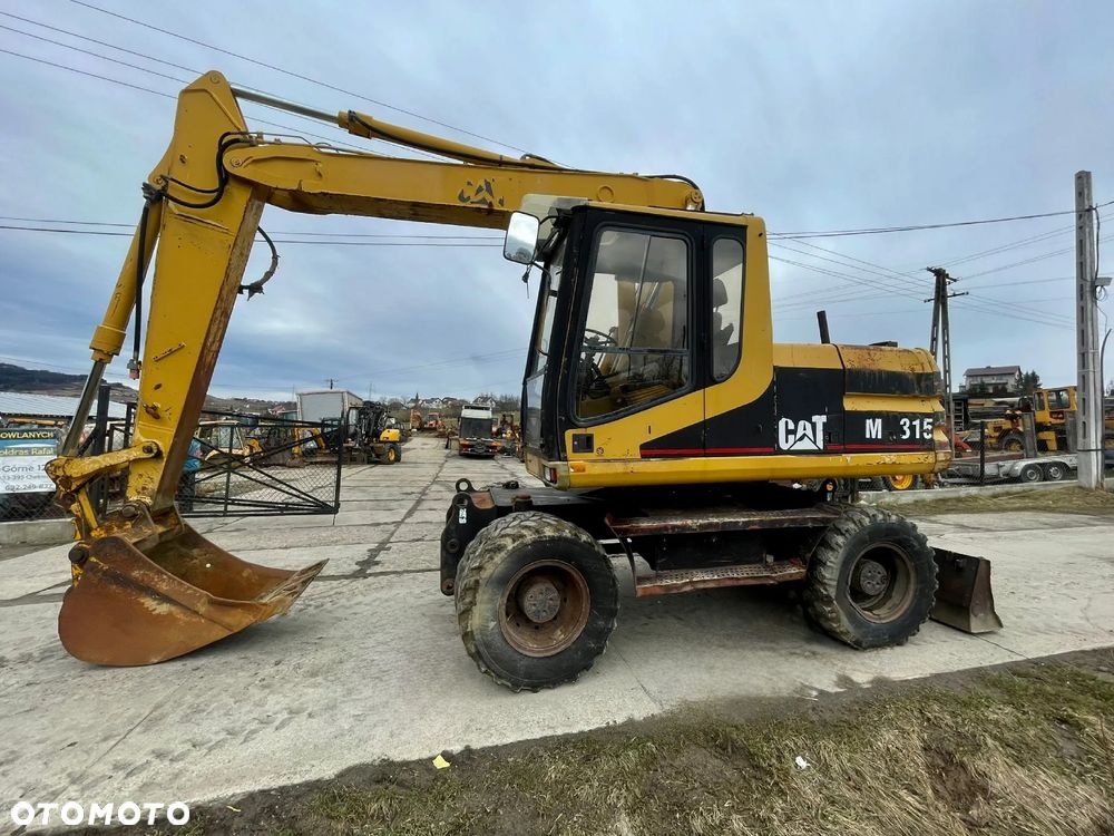 Caterpillar M315* KOPARKA KOŁOWA CATERPILLAR M 315* Leasing* Zamiana* Skup*