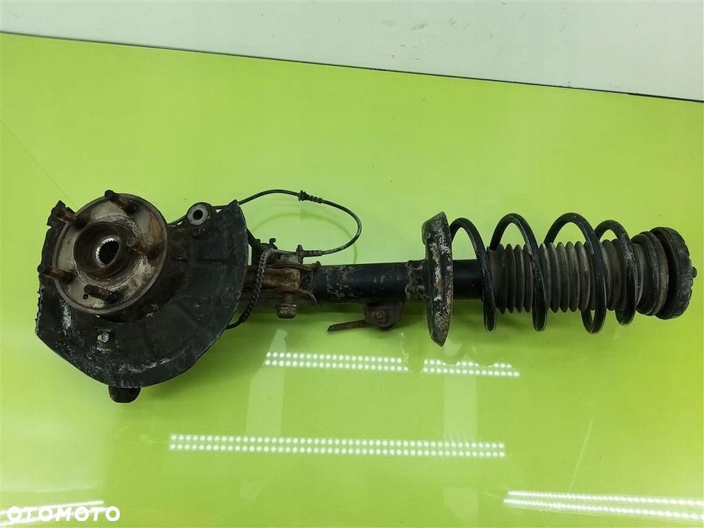 Mcpherson AMORTYZATOR przód lewy Chevrolet Aveo III 2011-2014 1,3 DIESEL - 1