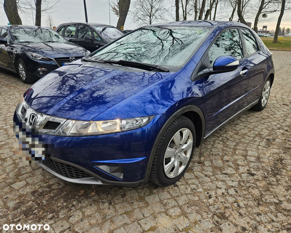 Honda Civic 1.4 i-VTEC Comfort - 1