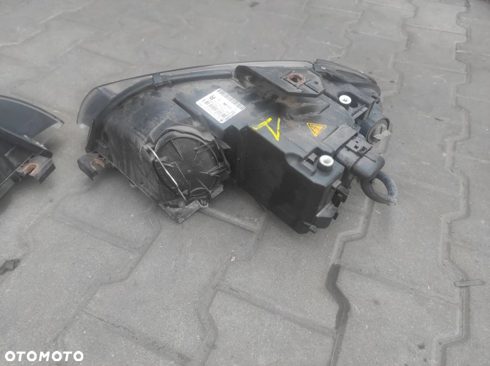 AUDI A3 8P 03-08R LAMPA LEWA PRAWA PRZEDNIA LEWY PRAWY PRZÓD BIXENON SKRĘTNY EUROPA 8P0941029R ORYGINALNE CAŁE WYSYŁKA !!!!! - 8
