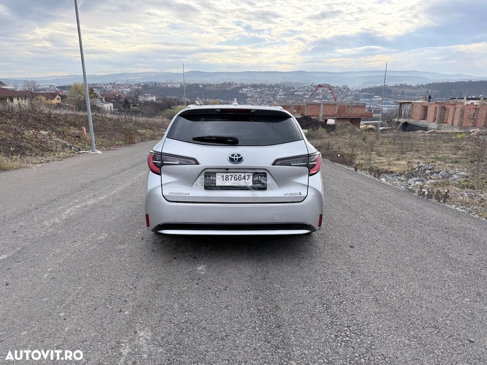 Toyota Corolla 1.8 HSD Business - 34