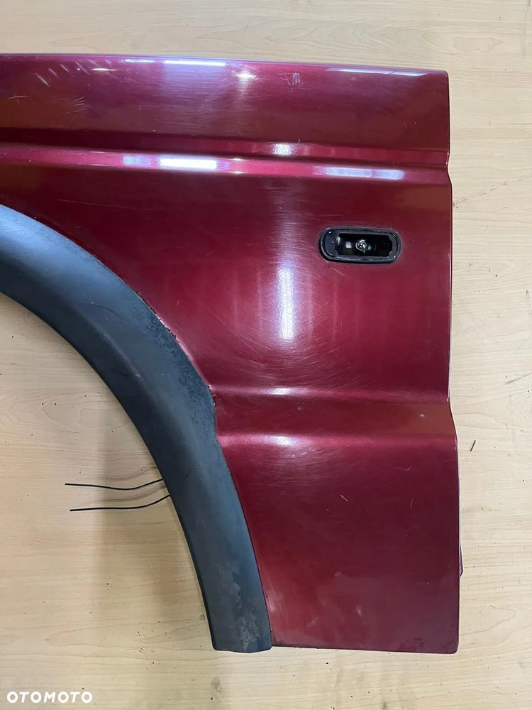 Błotnik przedni lewy Kod koloru 696 Land Rover Discovery 2 II - 2