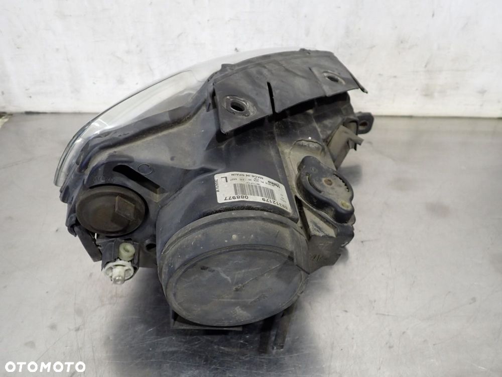 LAMPA LEWA PRZEDNIA VOLKSWAGEN PASSAT B6 - 4