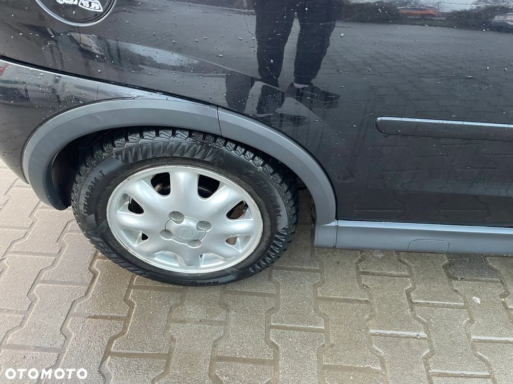 Opel Corsa 1.2 16V Cosmo Easytronic - 12