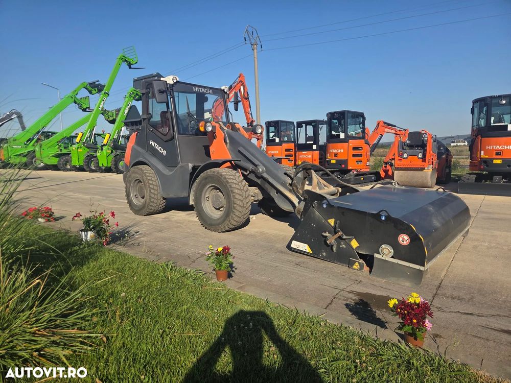Hitachi ZW75-6, 2019, 2.745h, CUPA MULTIFUNCTIONALA 1mc, FURCI, CUPLA RAPIDA, ridica 2,4 tone la 3,2m, incarca 8x4 si  sem basculabila, Masa operationala 5tone, Anv 80% ok, motor 75CP, produs in Germania, posibilitate leasing 3 ani-PROMOTIE 29.900 EUR+Tva - 5