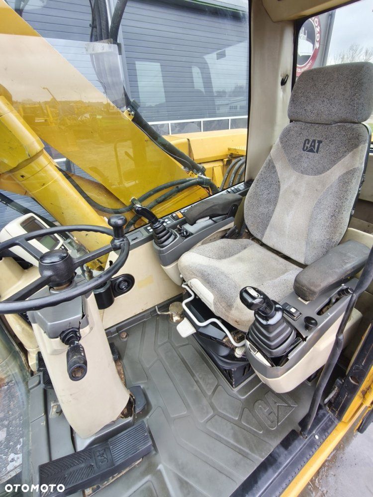 Caterpillar M318C - 14