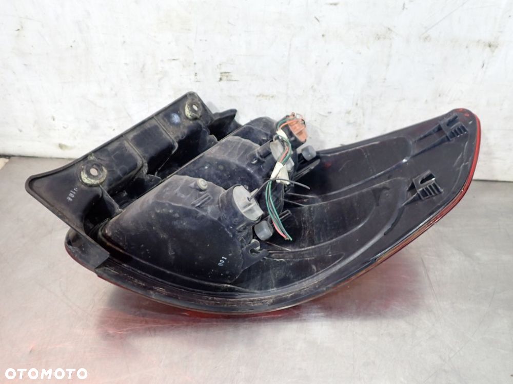 LAMPA LEWA TYLNA SUZUKI SX4 1.6 - 7