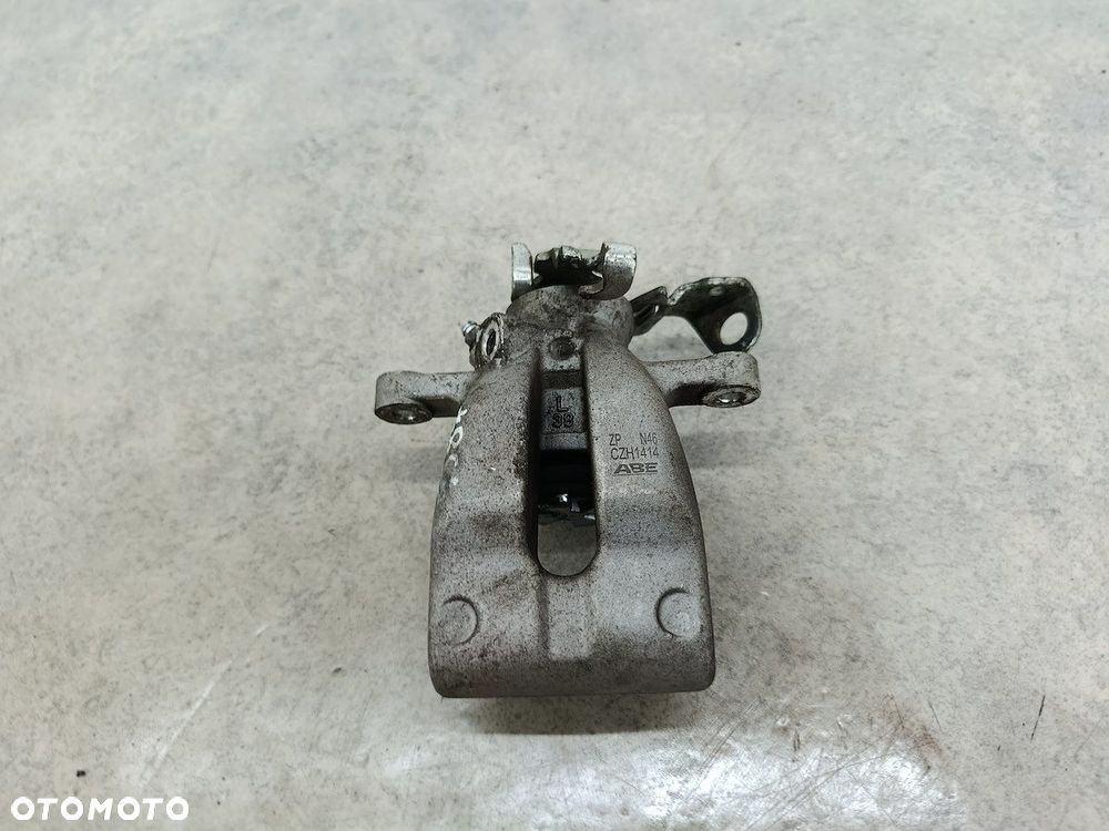 ZACISK HAMULCOWY LEWY TYŁ OPEL ASTRA H CZH1414 ABE 1.9 CDTI - 1