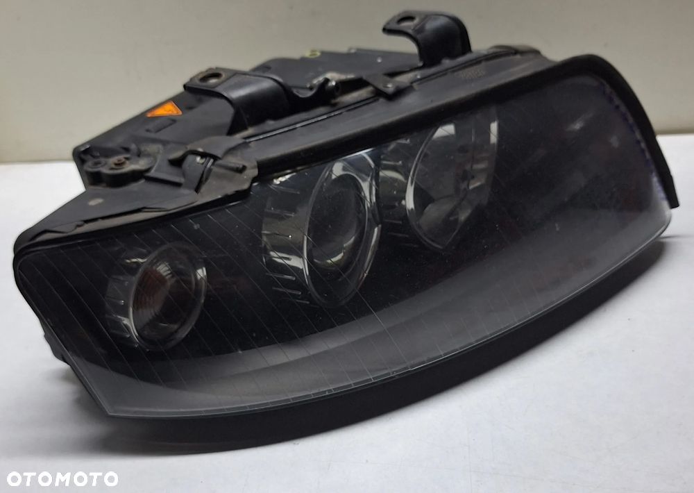 LAMPA XENON PRAWY PRZÓD  -AUDI A4/B6 -VALEO-8E0941004- EUROPA - 1