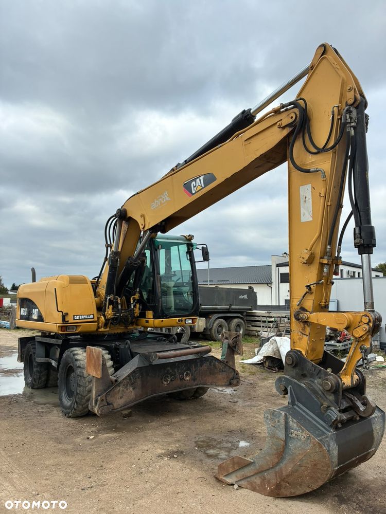 Caterpillar M318C - 1