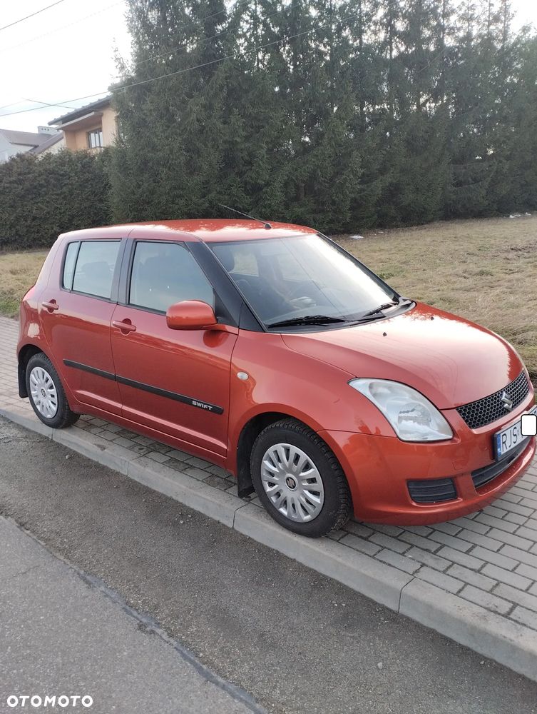 Suzuki Swift 1.3 Sakura - 1