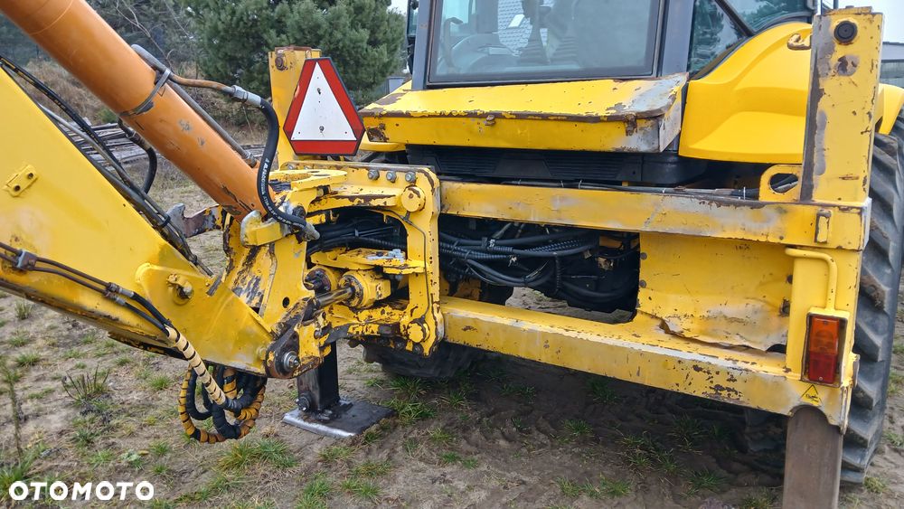 New Holland LB 115 - 37