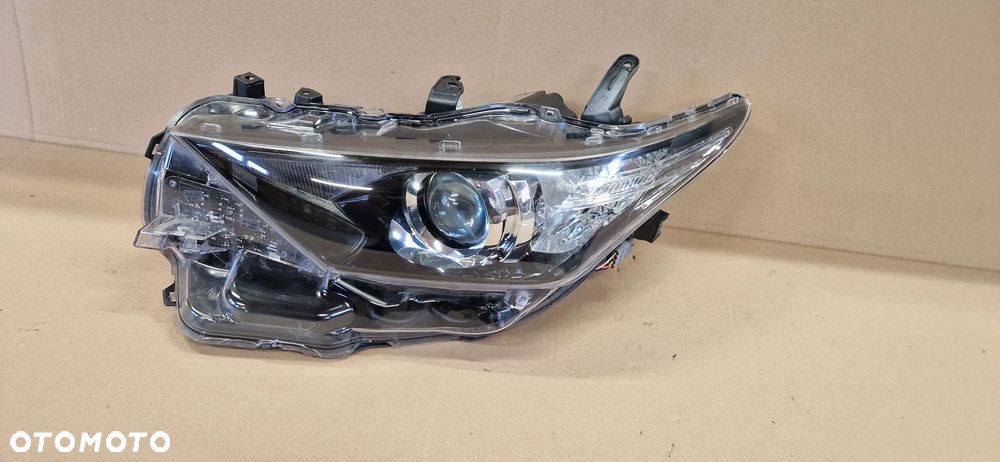 TOYOTA AURIS II LIFT REFLEKTOR LEWY 81150-02K30 ORYGINAŁ EUROPA LAMPA - 2