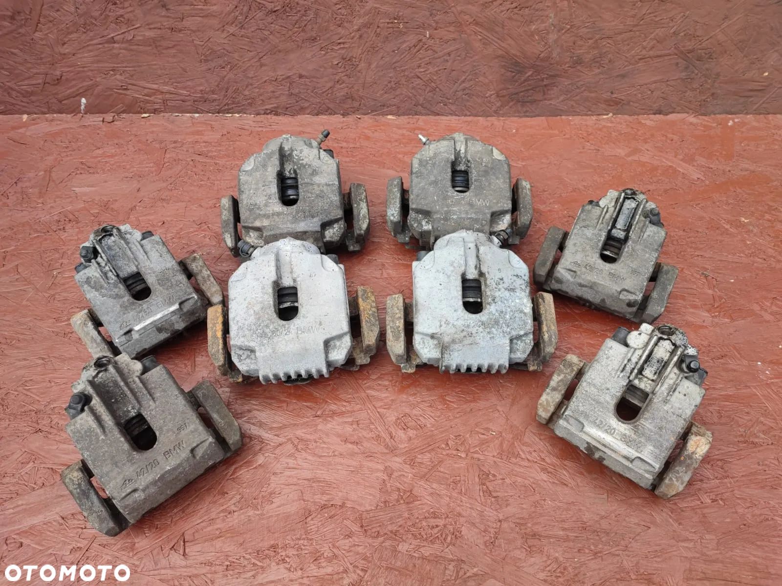 BMW E60 / E60 LCI / E61 / E61 LCI / E63 / E63 LCI / E64 / E64 LCI / E65 / E66. ORYGINALNE ZACISKI HAMULCOWE + JARZMA DO SILNIKÓW GAMY M57D25 / M47D20 / M54B22 / M54B25 POD TARCZĘ HAMULCOWĄ PRZÓD 310MM / TYŁ 320MM. O NR: 6 753 659 / 6 753 660 / 6 765 909 / 6 765 910 OEM. SPRAWNE W 100%. - 1