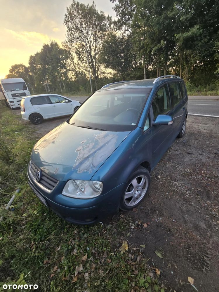 Volkswagen Touran ver-1-9-tdi - 4