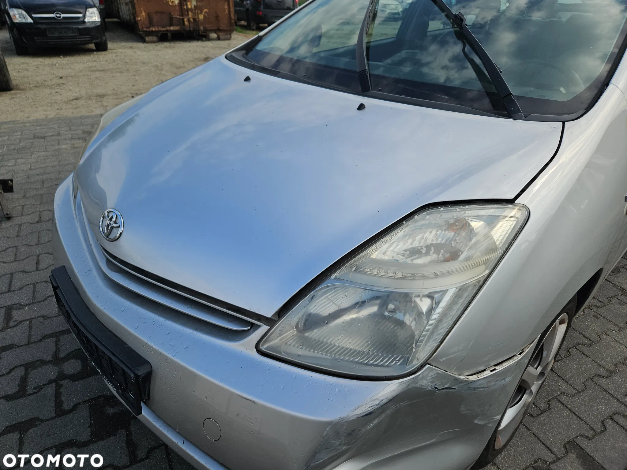 Maska pokrywa Toyota Prius II 2005r lak. 1C0 - 2